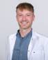 Portrait Dr. Felix Schneiderhan, Traumlächeln Berlin, Berlin, Kieferorthopäde